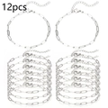 Dettaglio di 12 braccialetti a catena graffetta argento con chiusura a moschettone regolabile - Color Acciaio
