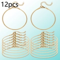 Set of 12 gold-plated snake chain bracelets featuring lobster clasps and extension chains - Gold