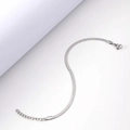 Detailed close-up of a silver snake chain bracelet with lobster clasp on a white surface - Length 17cm+5cm / 3.0mm Width / Steel