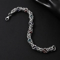 Detailed close-up of Byzantine weave bracelet with colorful sapphire glass beads - Multi-color Gemstones