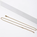 Detailed macro view of the gold box chain necklace with a secure lobster clasp closure - 1.2mm*40+5cm / Gold