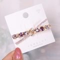 Elegant gold alloy hair clip with purple marquise rhinestones on a display card - K9 / Light Violet