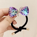Luxurious black hair tie with sparkling purple crystal bow and diamond accent - Single Layer Rhinestone Bow / Purple
