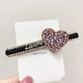 Haarklammer mit gewebtem Band, lila Strass-Herz und goldenem Loveme-Schriftzug - Lila