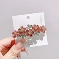 Detail einer rosa Kristallblume Haarklammer mit Goldbasis und glänzenden Strasssteinen - Fünfblättrige Blume Federclip / Rosa