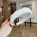 White organza braided headband featuring a twist design and elegant mesh texture - Off White