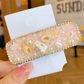 Barrette bohème rose avec coquillage, perle et strass dans un design rectangulaire - Carré Rose