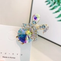 Elegante pinza de pelo de conejo dorado con cristales de colores y pedrería - Conejo Blanco AB