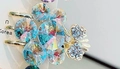Elegant gold hair clip with colorful iridescent crystals and small rhinestone bow - Grape White AB