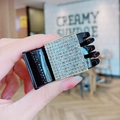 Close-up of a black hair claw clip with a square panel of shimmering rhinestones - 5x3cm Solid Square Claw / Black