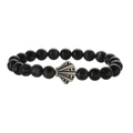 Detailed close-up of handmade black beaded bracelet with silver shell metal charm - Larvikite