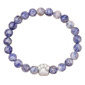 Detail shot of 10mm blue and white natural stone beads with a silver dog paw charm - Sodalite