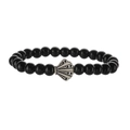 Detailed view of black onyx beaded bracelet featuring a vintage shell-shaped metal charm - Glossy Black Stone Bracelet