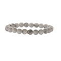 Detailed macro shot of white howlite beads and silver shell charm on handmade bracelet - Howlite and Shell