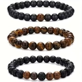 Detail view of 3pcs set featuring tiger eye, lava rock and matte black beaded bracelets - Yellow Tiger Eye Matte Black Lava