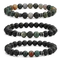 Detailed close-up of 8mm beaded bracelets set with lava rock, hematite, and tiger eye - Indian Agate Style