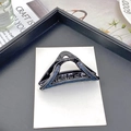 Dettaglio della pinza per capelli a triangolo con strass blu su base nera lucida - Base Nera Triangolo Con Strass Blu