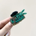 Dettaglio della molletta per capelli a coniglio verde smeraldo con cristalli e oro - Verde (5cm)