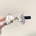 Elegant hair clip with purple faceted beads, pearls, rhinestones, and pink micro-rose - Bow Purple Duckbill Clip