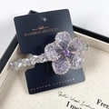 Elegante fermaglio per capelli a petalo con strass viola e cristallo centrale scuro - Viola