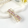 Golden alloy bow hair clip featuring pink teardrop crystals and sparkling rhinestones - Teardrop Pink