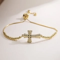 Bracelet croix en cuivre plaqué or 18K avec zircon noir et chaîne réglable pour femmes - Style Croix Sertie de Zirconia et Pierre Noire (32455) / Or