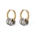 Detailed macro of minimalist two-tone hoop earrings with dangling silver rings - Gold Hoop With Silver Rings (46215)
