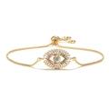Detailed close-up of golden evil eye bracelet with malachite bead and zircon stones - Gold Style (30439)
