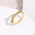 Detail of gold-plated adjustable ring featuring three round white zircon stones on stone base - Adjustable Open / White Clear Zirconia Style (11238)