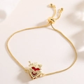 Bracciale regolabile placcato oro 18K con ciondolo a cuore rosso e rilievo di rosa - Stile Cuore di Rosa (32084)