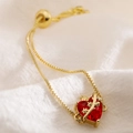 Verstelbare 18K gouden armband met met doornen omwikkelde rode hartsteen - Doornenhartstijl (32086)