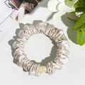 Detail of champagne silk scrunchie with pearl beads and satin pleated texture - Silk Pleated Small Scrunchie - Light Pink