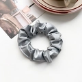 Detail showing the silky texture and fine stitching of a silver-grey satin scrunchie - Silk Pleated Large Scrunchie - Smoky Gray