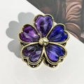 Detailed close-up of a golden flower hair claw with purple gradient resin petals - 7.5cm Gold Edge Heart Flower - Deep Purple