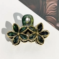 Detail of dark green marble hair claw clip with gold edges and petal flower design - 9cm Gold Edge Double Flower - Army Green