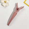 Detail of matte lotus root pink hair root clip with anti-slip design and metal spring - Duckbill Volumizing Clip / Pink
