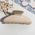 Detailed view of beige glossy resin hair claw clip with large curved teeth for thick hair - Square Head Clip / Light Coffee