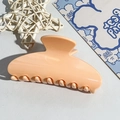 Detailed close-up of a glossy apricot semi-circular hair claw clip for elegant hairstyling - 10.5CM Square Head / Orange