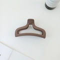Minimalist matte dark chocolate brown mermaid tail hair claw clip for women back of head style - Coffee
