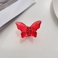 Detail of red transparent butterfly hair claw clip with crystal facets and spring - Garnet Red
