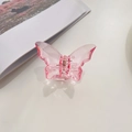 Durchscheinende rosa Schmetterling Haarklammer mit Goldfeder und elegantem Harz-Finish - Rosa
