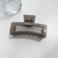 Macro shot of large translucent smoky gray square hair claw clip with metal spring - Square Style Gray