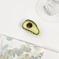 Detail of creative avocado claw clip with glossy finish and durable black teeth structure - Avocado