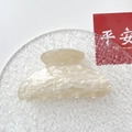Detailed close-up of cream marble acrylic hair claw clip with smooth polished texture - Champagne Water Ripple Square Head