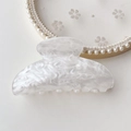 Detailed close-up of large marbled acetate hair claw clip with pearlescent resin texture - White Water Ripple Square Head