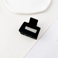 Close-up of matte black square hair claw clip with a hollow geometric design - Matte Black
