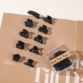 Lot de 10 mini pinces à cheveux noir mat de formes variées dans une boîte transparente - Style Noir Mixte (En Boîte)