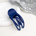 Close-up of a matte navy blue hollow U-shaped hair claw clip with smooth frosted texture - Matte Navy Blue