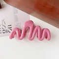 Detailed view of glossy bright pink wave-shaped hair claw clip on a white background - 11cm Wave / Glossy Rose Red