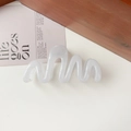 Detail shot of wavy cream white hair claw clip on magazine with soft shadows - 11cm Wave / Jelly Off-white